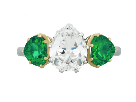 Drop shape old mine diamond and emerald ring. hatton garden