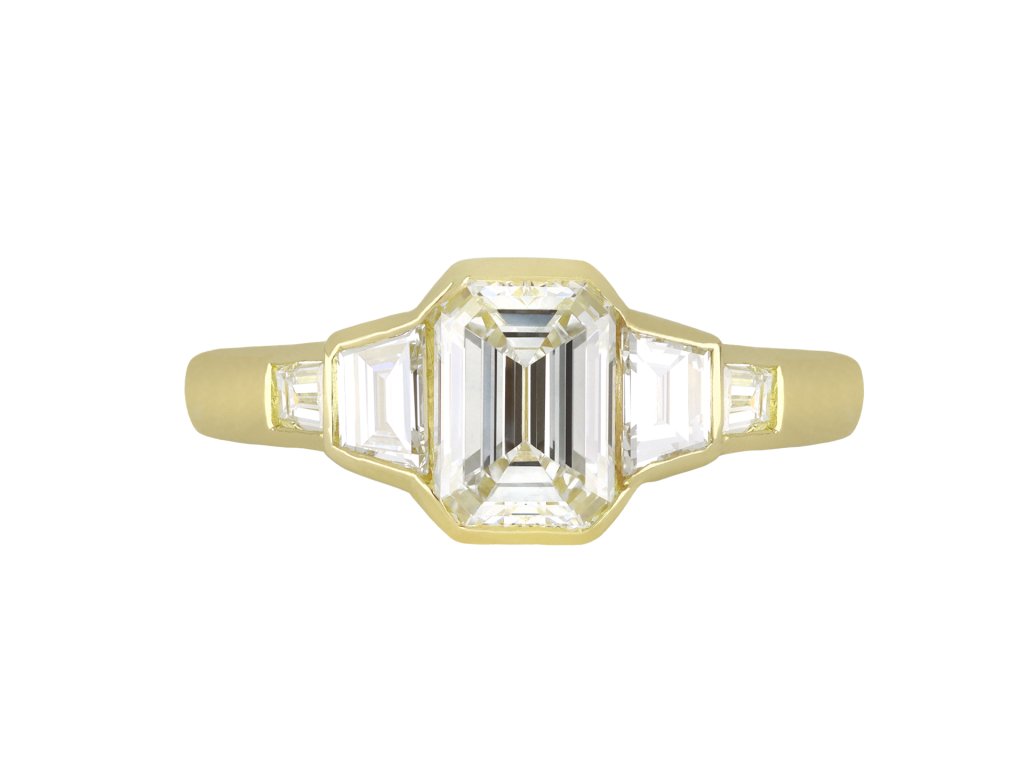 Vintage diamond flanked solitaire, circa 1970.