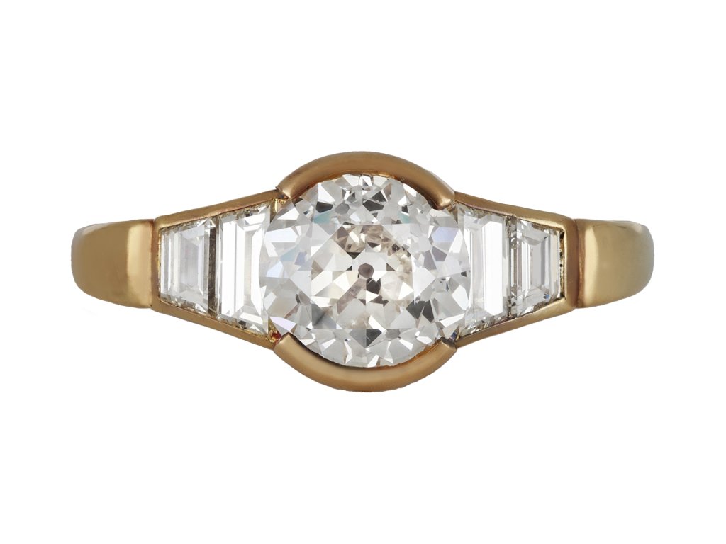 Vintage diamond flanked solitaire ring, circa 1970. hatton garden