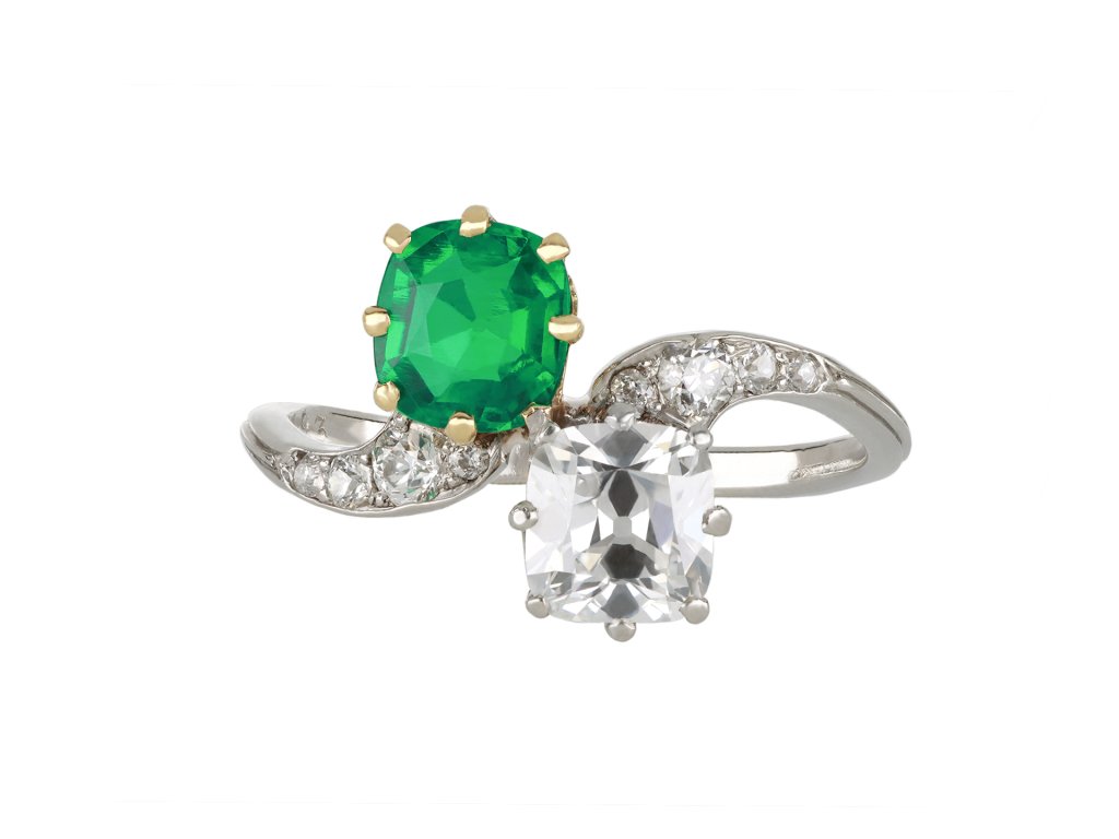 Colombian emerald and diamond crossover ring, French, circa 1920.