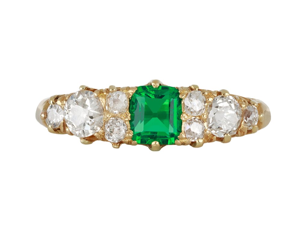 Emerald and diamond carved ring, circa 1890. hatton garden