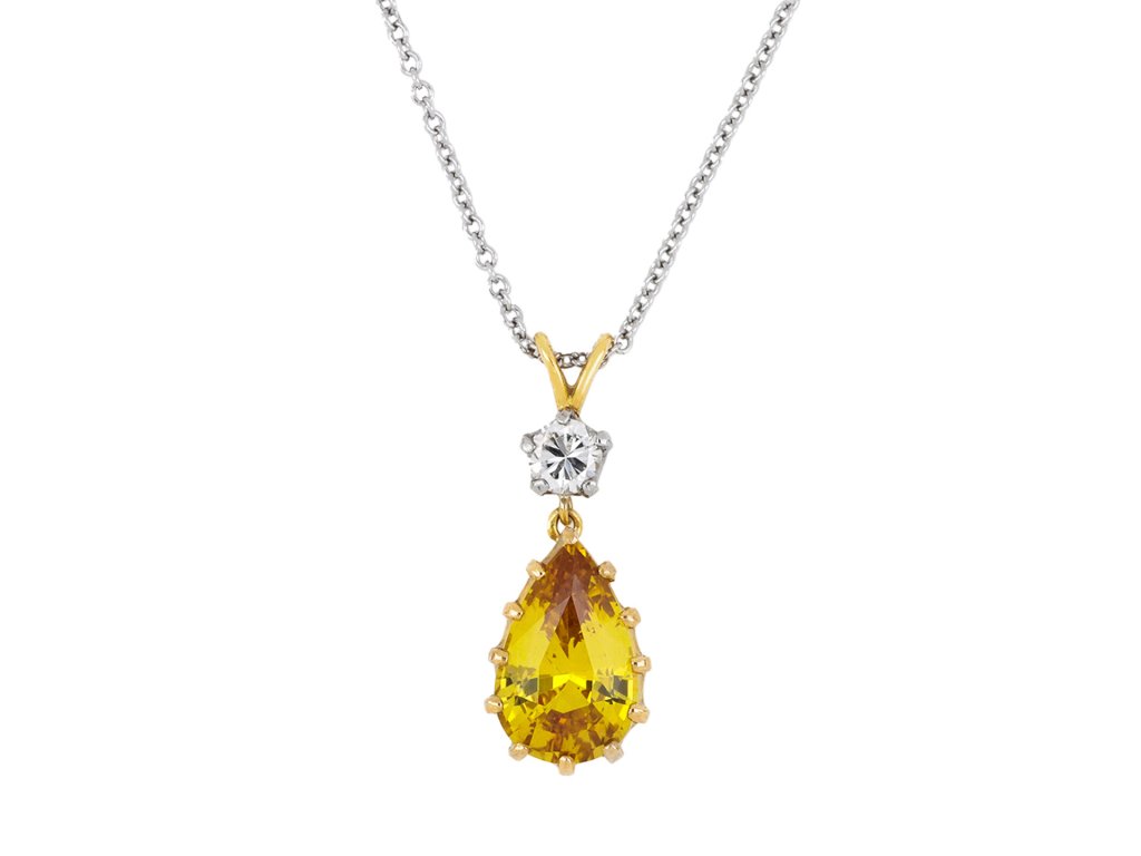 Yellow sapphire and diamond drop necklace, English. hatton garden