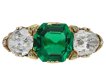 Victorian Colombian emerald and diamond carved three stone ring, English, circa 1890.