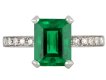 Colombian emerald and diamond flank solitaire ring, circa 1925.