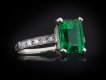 Colombian emerald and diamond flank solitaire ring hatton garden