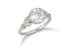 Old cut diamond flanked solitaire ring, circa 1910. 