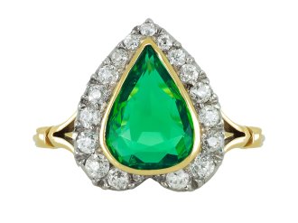 No oil Colombian emerald and diamond cluster ring, circa 1905.