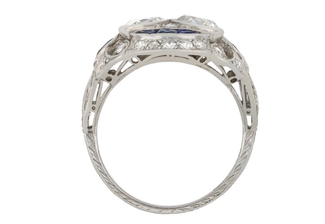 Two stone diamond and synthetic sapphire cluster ring, circa 1920.