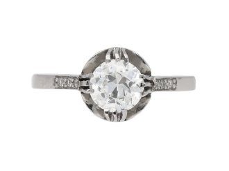 Diamond flanked solitaire ring, circa 1915.