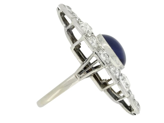 side view Cabochon Burmese sapphire and old cut diamond cluster ring