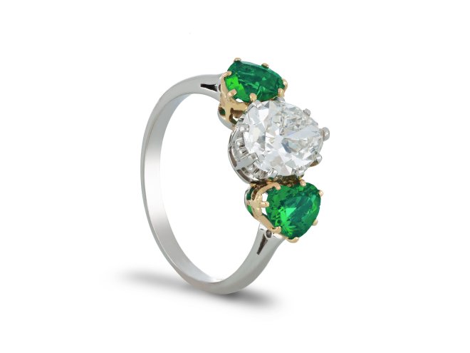 Drop shape old mine diamond and emerald ring. hatton garden