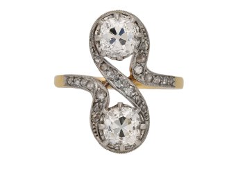 Belle Époque diamond two stone crossover ring, French, circa 1905. 