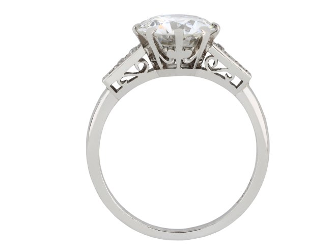 Old cut diamond flanked solitaire ring, English hatton garden