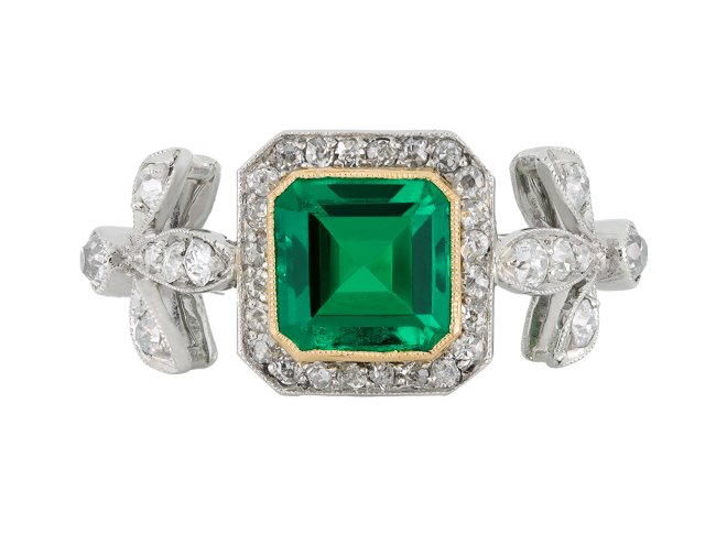 Colombian emerald and diamond cluster ring. hatton garden