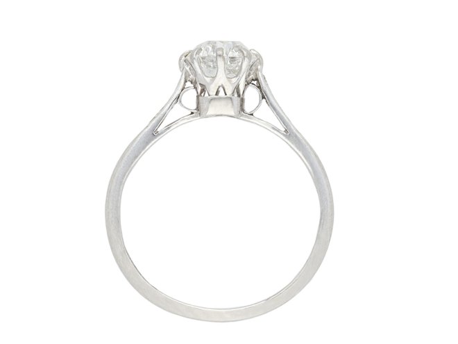 Old cut diamond flanked solitaire ring, circa 1920. Hatton Garden 