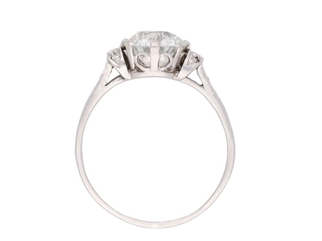 Old cut diamond flanked solitaire ring, circa 1920.  Hatton Garden