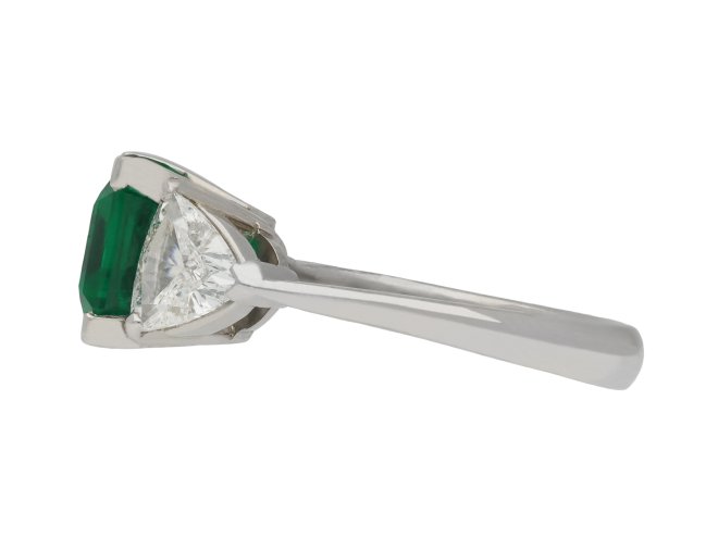 Colombian emerald diamond flanked solitaire ring hatton garden