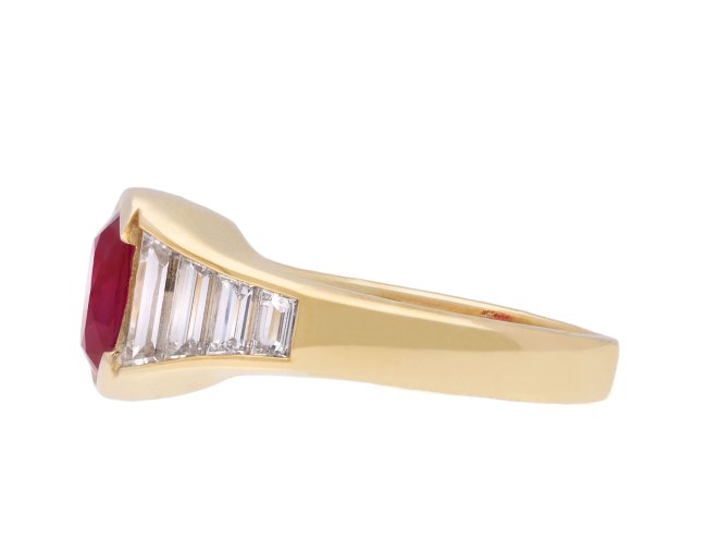 Burmese ruby and diamond flank solitaire ring, circa 1950. Hatton Garden