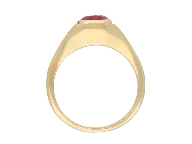 Burmese ruby and diamond flank solitaire ring, circa 1950. Hatton Garden