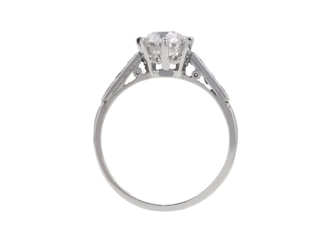 Old Cut Diamond flanked solitaire, circa 1920. hatton garden