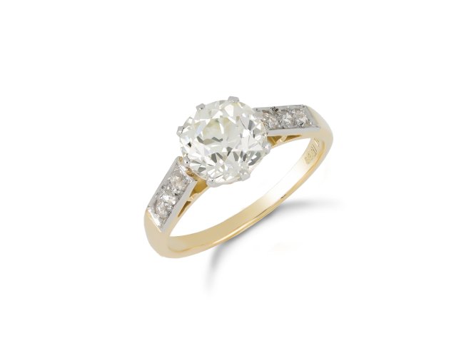 Old cut diamond flanked solitaire ring, circa 1910. hatton garden