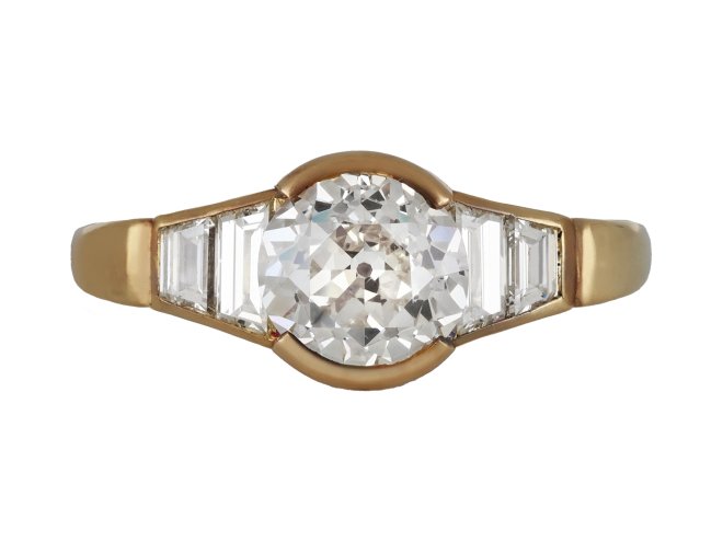 Vintage diamond flanked solitaire ring, circa 1970. hatton garden