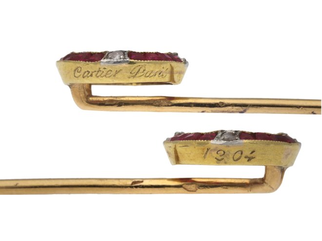 Cartier ruby and diamond winning post pin, berganza hatton garden