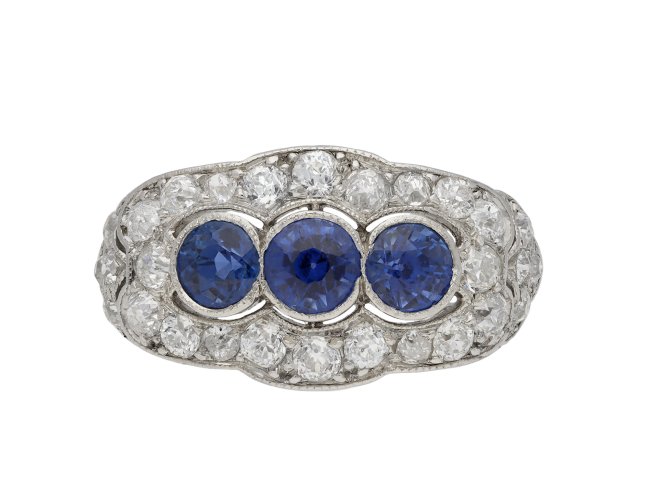 Three stone sapphire and diamond ring, circa 1920. Hatton Garden