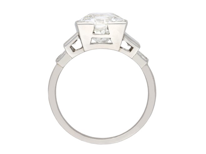 Art Deco diamond flanked solitaire ring, English, circa 1930. Hatton Garden