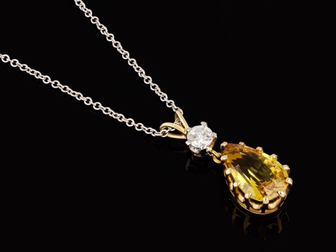 Yellow sapphire and diamond drop necklace, English. hatton garden